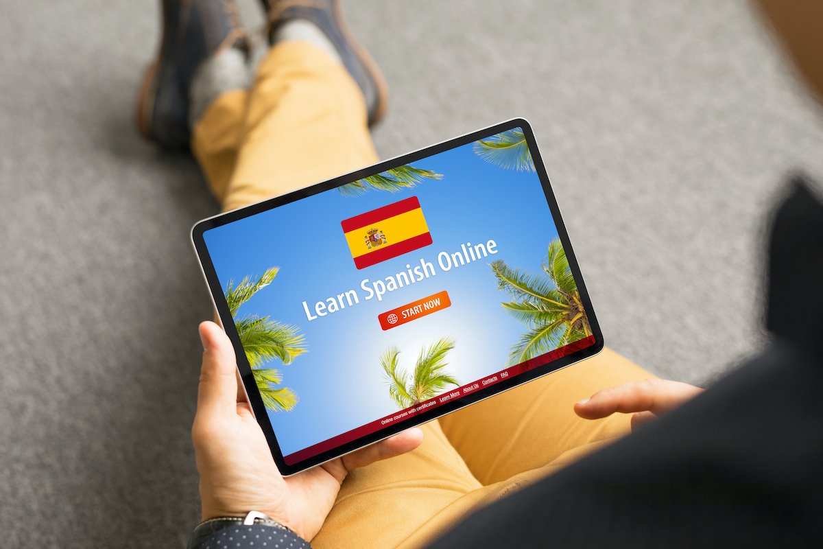 Student loading their Houston online spanish class on a tablet