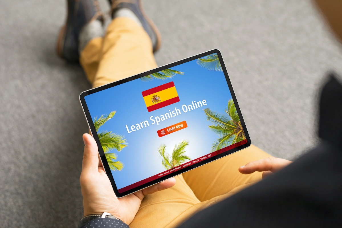 Student loading their Houston online spanish class on a tablet